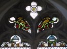 Here be dragons. Note the wheel of St Catherine in the quatrefoil.