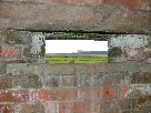 view of Sizewell B from within the machine gun emplacement