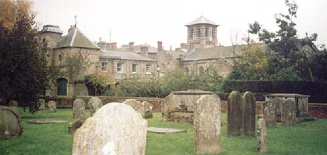 Old Hall from the churchyard of St Mary. The long building to the right of the bell tower is the chapel.