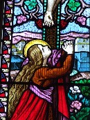 Mary Magdalene at the foot of the cross