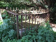 caged grave