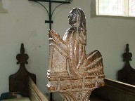 lady at a prayer desk