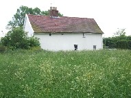 cottage at the edge of the graveyard