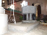font on an altar mensa