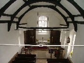 under a barrel-vaulted roof